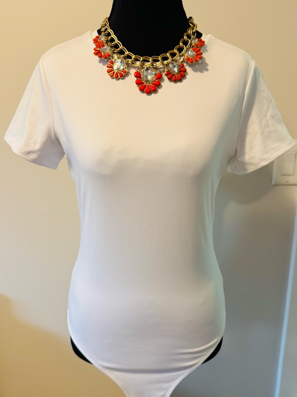 Classic White Women’s Short Sleeve Bodysuit.